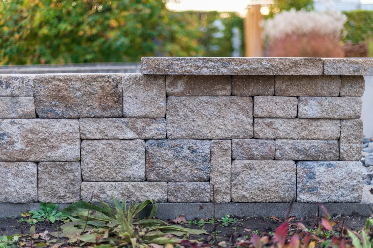 Example of hardscaping in Buffalo, NY, featuring stonework, patios, retaining walls, or other non-plant landscape structures.